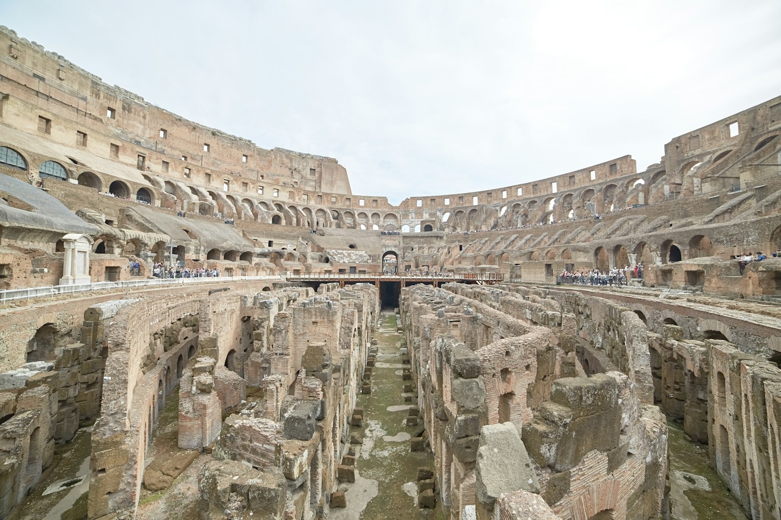 Interior of the Colosseum in Rome, showing its ancient walls and exposed underground structures